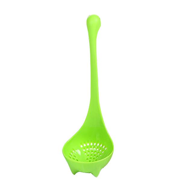 Dinosaur Standing Spoon - held in one hand for scale