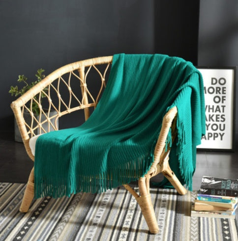 Fringed Knitted Throw Blanket - styled on a bed