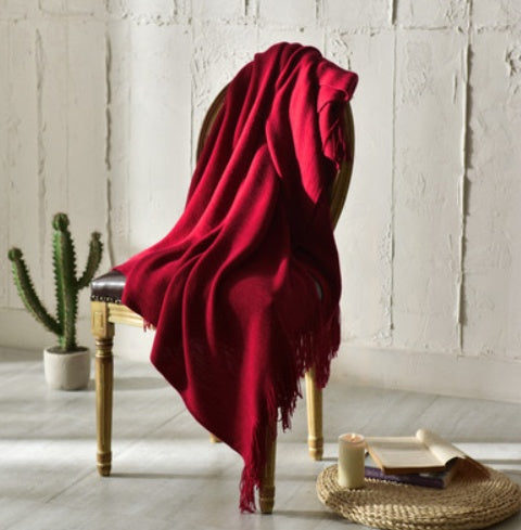 Fringed Knitted Throw Blanket - in a reading nook