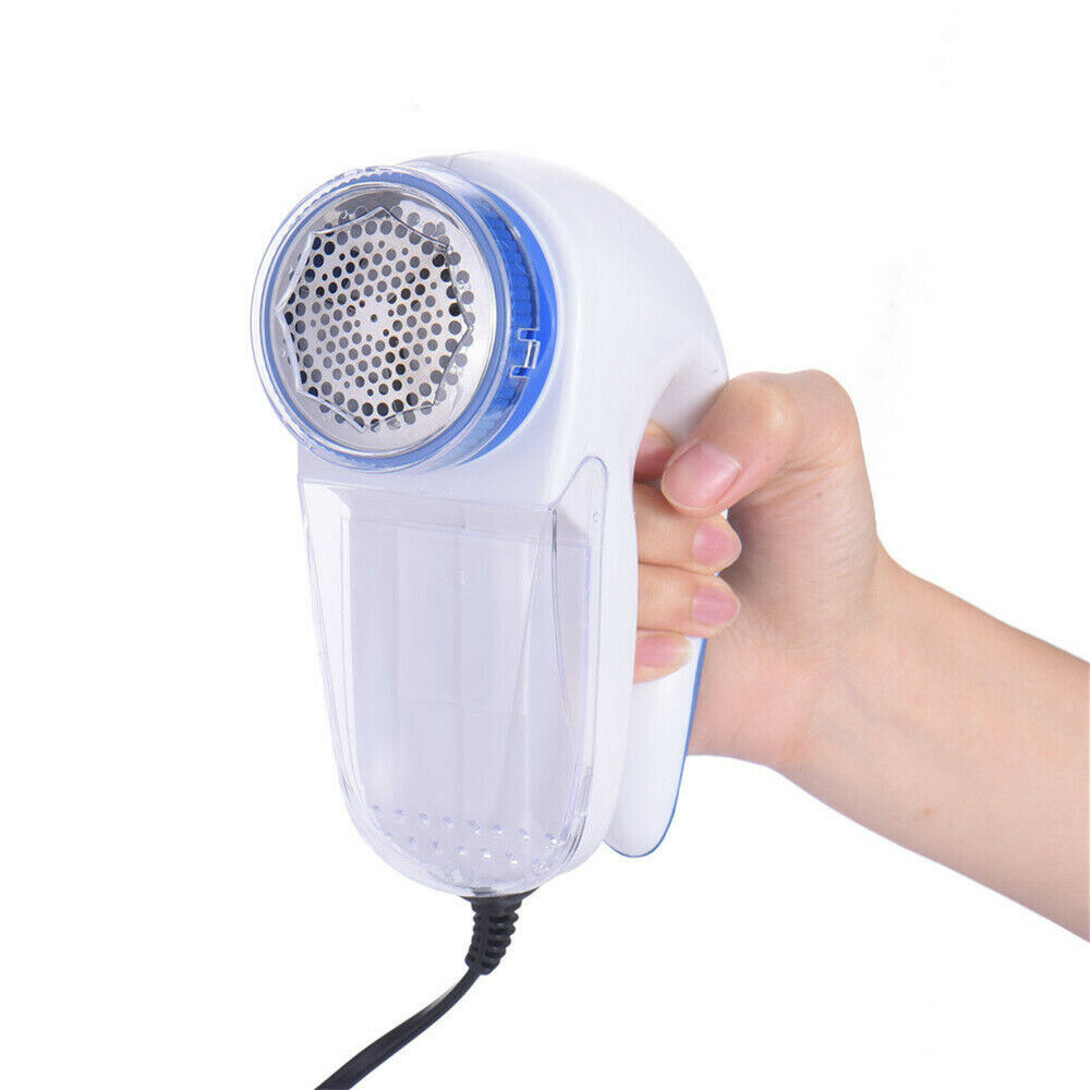 Electric Lint Remover and Fabric Shaver - in use removing lint
