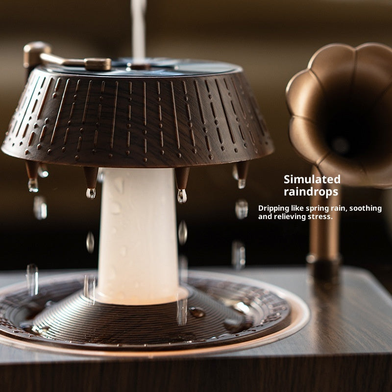 Retro gramophone aroma diffuser releasing cool mist