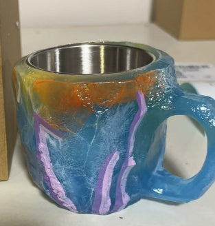 Crystal-Effect Resin Mug - mug set beside a book