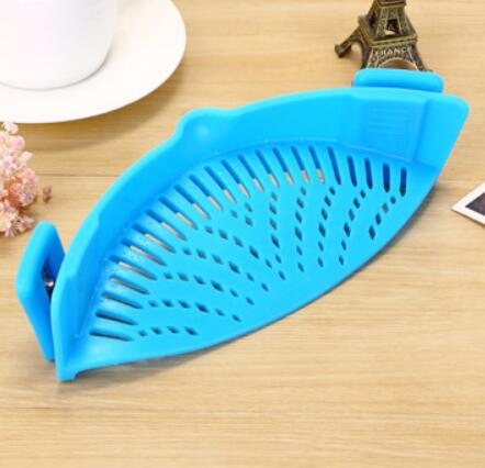 Silicone Clip-On Pot Strainer and Colander - straining vegetables