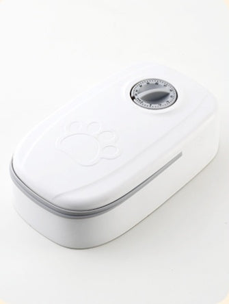 Automatic Pet Feeder - a dog being fed
