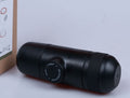 Portable Mini Coffee Machine - close-up of the capsule chamber